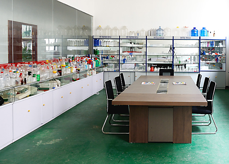 A variety of PET PP PC plastic containers in the sample room, Bottle Blowing machine